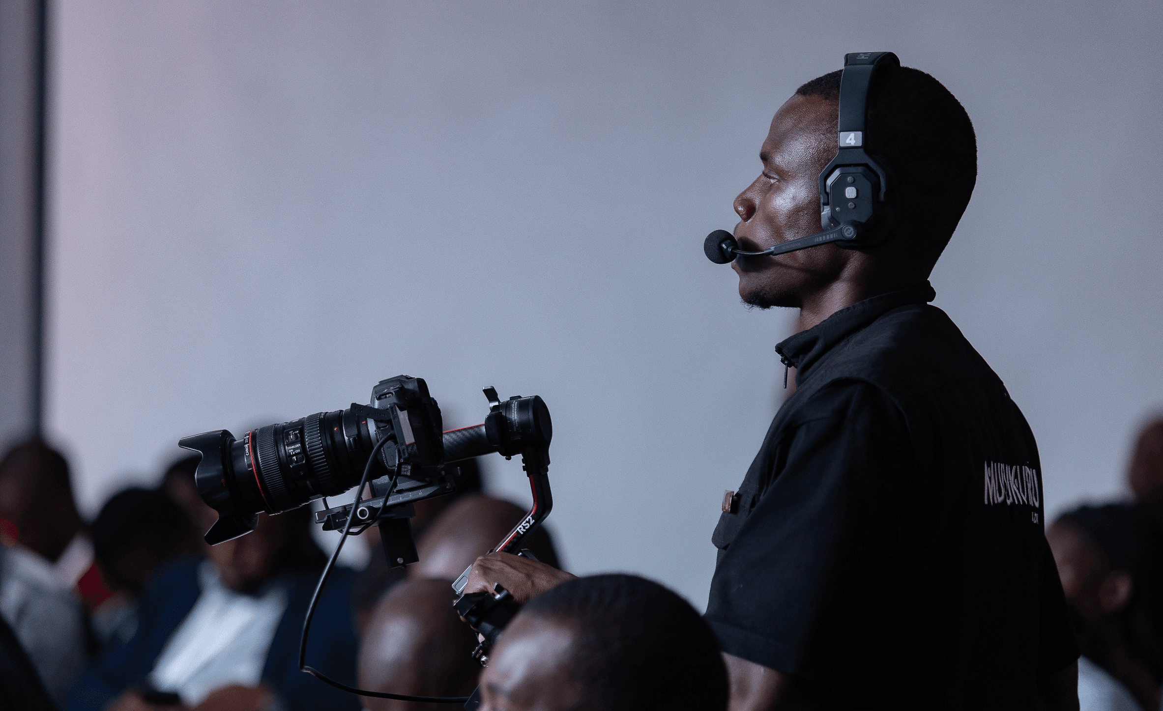 Llyod Ndebele holding a camera